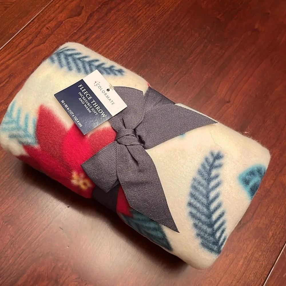 NWT Holiday fleece throw blanket featuring poinsettias, from Colormate